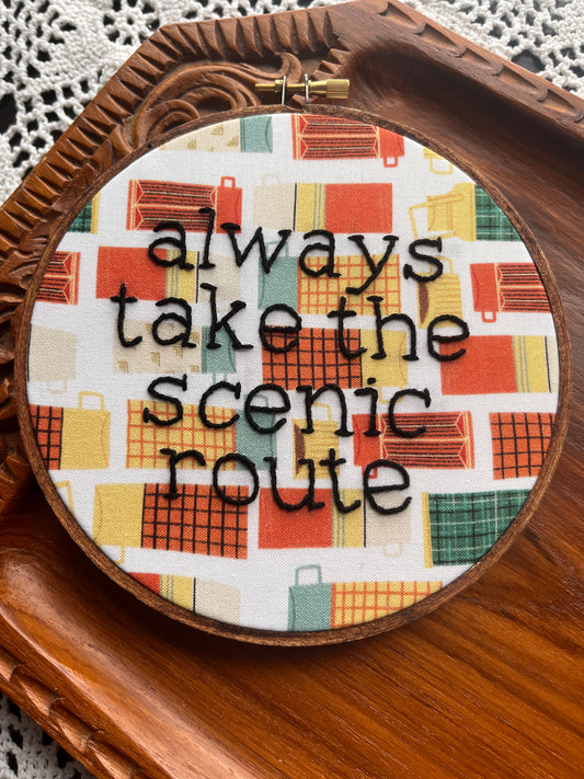 "always take the scenic route" hand embroidered saying in 6" wooden embroidery hoop