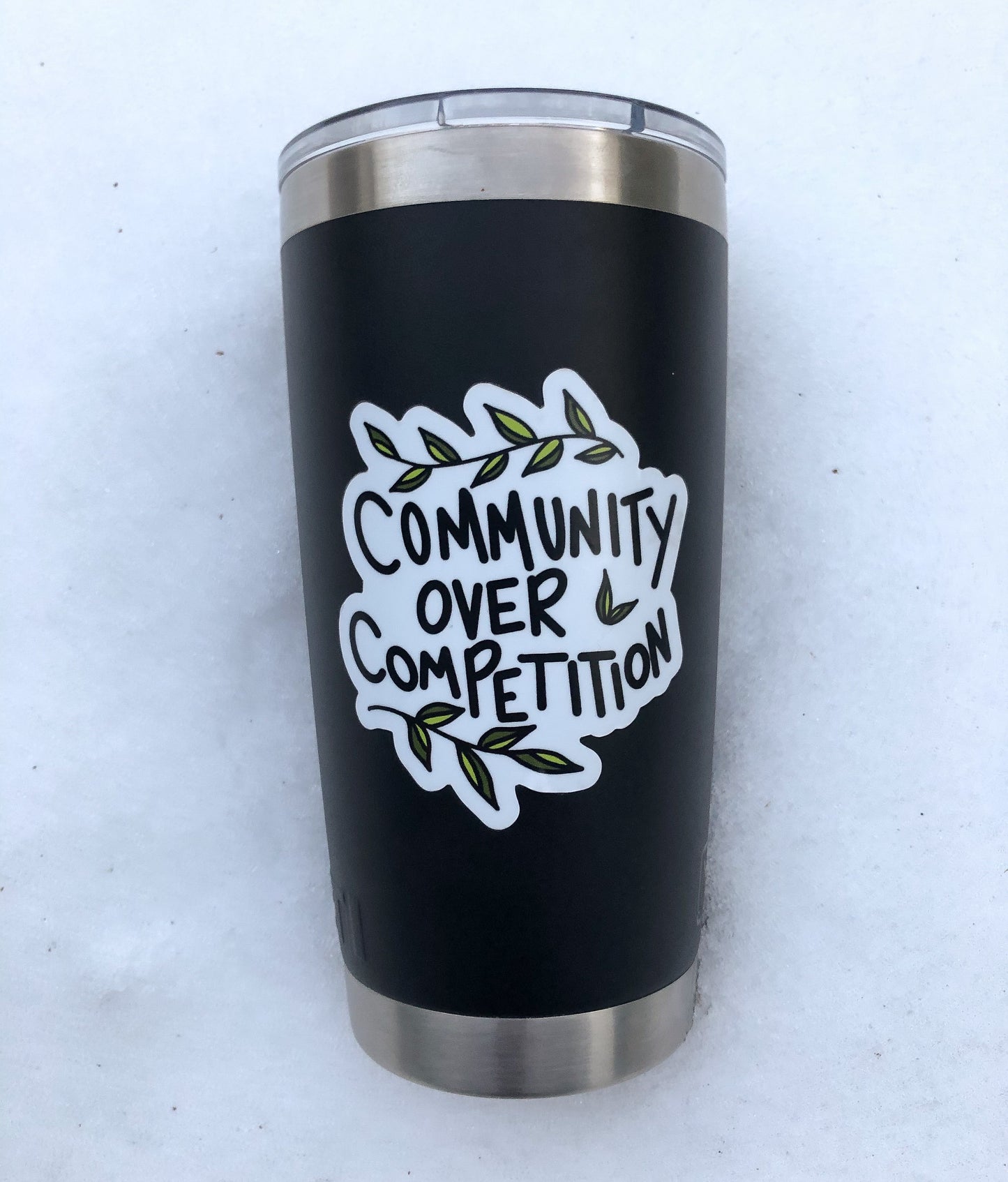 Community over competition sticker